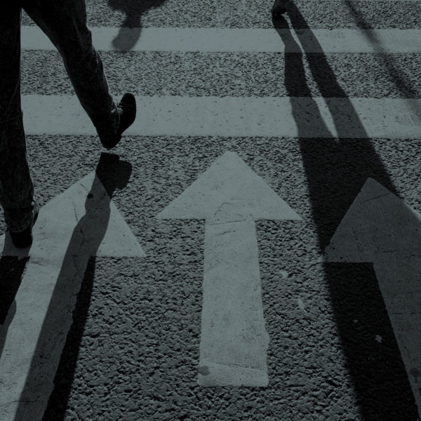 walking on a cross walk | Market Research Firm | Public Opinion Research | Meeting St. Insights